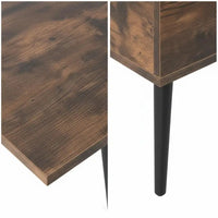 Table basse relevable à deux niveaux